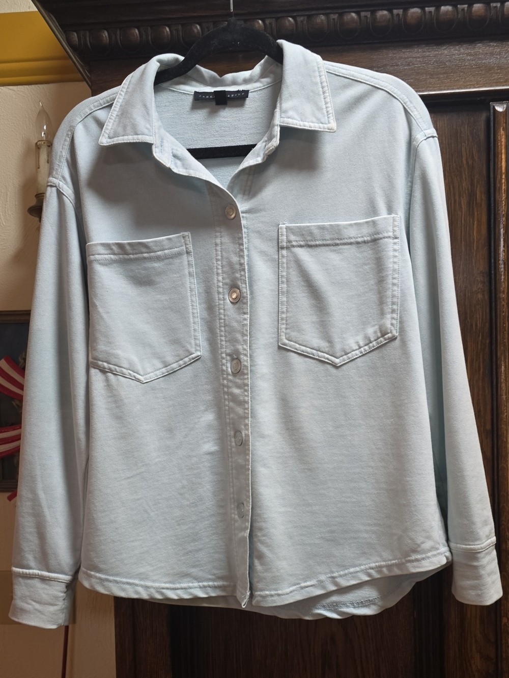 Womans Pale blue button down top...